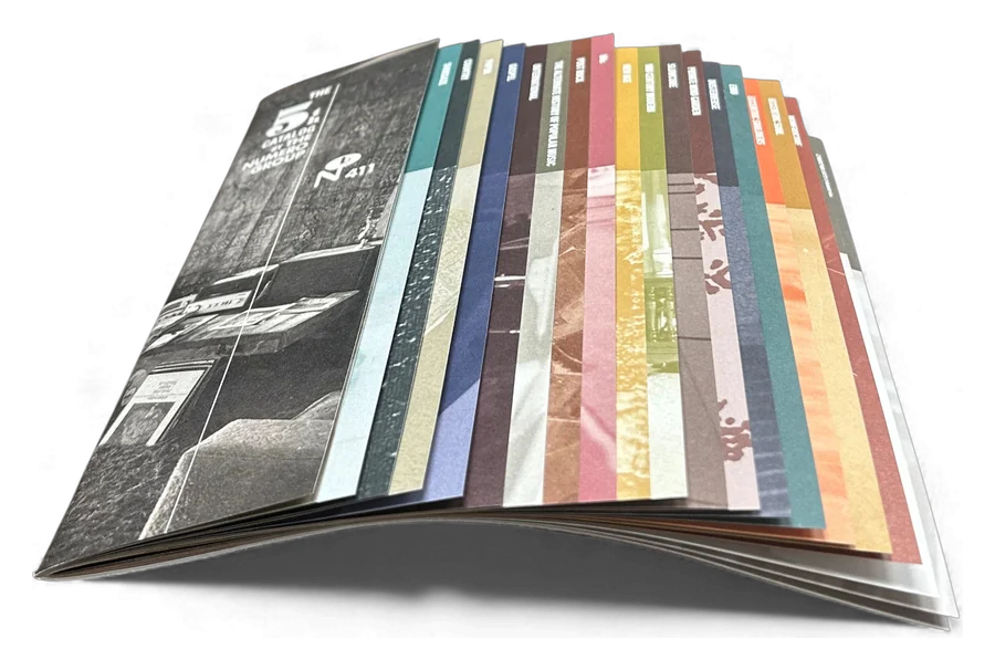 A fanned set of saddle-stitched booklets